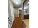 Inviting entryway with hardwood floors leading to the living spaces at 1955 Nocturne Dr # 3105, Alpharetta, GA 30009