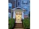 Welcoming front entrance with covered porch and well-maintained landscaping at 1955 Nocturne Dr # 3105, Alpharetta, GA 30009