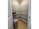 Walk-in pantry with wire shelving providing ample storage space at 1955 Nocturne Dr # 3105, Alpharetta, GA 30009