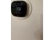 Image displays a smart thermostat, showcasing the home's modern temperature control system at 1955 Nocturne Dr # 3105, Alpharetta, GA 30009