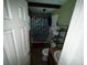 A bathroom with a shower tub, vanity with 2 sinks, and an overhead light at 199 Mckaskey Creek Se Rd, Cartersville, GA 30121
