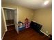 A bedroom with hardwood floors, a ceiling light, and doorway to another room at 199 Mckaskey Creek Se Rd, Cartersville, GA 30121