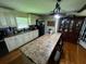 An open kitchen boasts ample counter space, modern appliances, and plenty of natural light at 199 Mckaskey Creek Se Rd, Cartersville, GA 30121