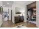 Bright foyer with hardwood floors, modern decor, and an open view to the dining area at 49 Conifer Park Ln, Atlanta, GA 30342