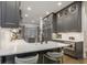 Well-designed kitchen with a center island, pendant lighting, and stainless steel appliances at 49 Conifer Park Ln, Atlanta, GA 30342