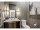 Modern powder room with geometric wallpaper, elegant lighting, and vanity at 49 Conifer Park Ln, Atlanta, GA 30342