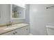 Bathroom with white vanity and mirror at 511 Barrington Hills Dr, Atlanta, GA 30350