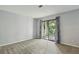 Bedroom with sliding glass doors to an outdoor balcony at 511 Barrington Hills Dr, Atlanta, GA 30350