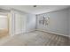 Bedroom with large closet and bright window with blinds at 511 Barrington Hills Dr, Atlanta, GA 30350
