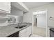 Bright kitchen with stainless steel sink and modern faucet at 511 Barrington Hills Dr, Atlanta, GA 30350