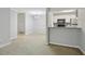 Inviting living area with a dining space, an open kitchen view, and neutral-toned walls at 511 Barrington Hills Dr, Atlanta, GA 30350