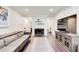 Comfortable living room with a stylish fireplace and contemporary furniture for relaxing at 1105 Clairemont Ave # J, Decatur, GA 30030