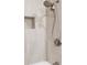 Close-up of the modern shower system with dual shower heads and tiled walls at 1105 Clairemont Ave # J, Decatur, GA 30030