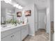 Elegant bathroom featuring double sink vanity, a large mirror, and decorative accents at 1311 Park Center Cir, Austell, GA 30168