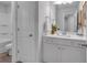 Bathroom featuring a white vanity with a sink, a mirror, and a separate room with a toilet and shower at 1311 Park Center Cir, Austell, GA 30168