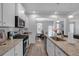 Well-equipped kitchen featuring stainless steel appliances, granite countertops, and convenient island sink at 1311 Park Center Cir, Austell, GA 30168