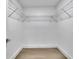 Walk-in closet with wire shelving and bright interiors, ready for organized storage at 1770 Austin Dr, Decatur, GA 30032