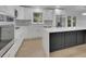Modern eat-in kitchen features stainless steel appliances, white cabinets and a gray island at 1770 Austin Dr, Decatur, GA 30032