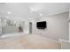 Finished basement with a fireplace, TV, and staircase at 2941 Foothill Trl, Marietta, GA 30066