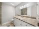 Bright bathroom featuring a granite-topped vanity, a neutral color palette, and a glass enclosed shower at 2941 Foothill Trl, Marietta, GA 30066