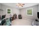 Bedroom with a ceiling fan, carpeting and computer desk for a home office at 2941 Foothill Trl, Marietta, GA 30066