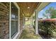 Charming front porch featuring stone accents, flagstone flooring and stylish columns at 2941 Foothill Trl, Marietta, GA 30066