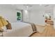 Comfortable bedroom with natural light and hardwood floors at 5601 Due West Rd, Powder Springs, GA 30127