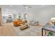 Bright open-concept living room featuring stylish decor and seamless flow to the modern kitchen at 5601 Due West Rd, Powder Springs, GA 30127