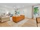 Warm and bright living room with a comfortable seating area and open floor plan at 5601 Due West Rd, Powder Springs, GA 30127
