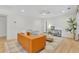 Cozy living room with lots of light from the windows, modern furniture and hardwood floors at 5601 Due West Rd, Powder Springs, GA 30127