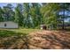Backyard with sheds and storage buildings at 995 Highway 101 S, Temple, GA 30179
