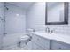 Bathroom with subway tile, white vanity, and marble-look floor at 995 Highway 101 S, Temple, GA 30179
