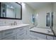 Bathroom features a marble vanity, soaking tub, and tile backsplash at 995 Highway 101 S, Temple, GA 30179