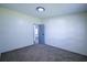 Neutral bedroom with carpet and an open doorway to another room at 995 Highway 101 S, Temple, GA 30179