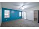 Spacious bedroom with two large windows and ensuite bathroom at 995 Highway 101 S, Temple, GA 30179