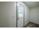 This home features an entry door with glass panes and neutral interior at 995 Highway 101 S, Temple, GA 30179