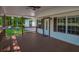 Inviting covered front porch featuring a comfortable sitting area, perfect for enjoying the fresh air and tranquil surroundings at 995 Highway 101 S, Temple, GA 30179