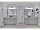Bathroom with dual sinks and large mirrors at 4256 Weaver Se St, Smyrna, GA 30080