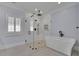 Bathroom featuring a glass shower and standalone tub under recessed lighting at 4256 Weaver Se St, Smyrna, GA 30080
