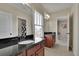 Spacious bathroom with double sink vanity, granite countertop, and a large mirror at 4256 Weaver Se St, Smyrna, GA 30080