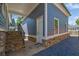 Stylish home exterior featuring stone accents, a covered entryway and a private side entrance at 4256 Weaver Se St, Smyrna, GA 30080