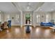 Spacious foyer with hardwood floors, elegant lighting, and bright windows at 4256 Weaver Se St, Smyrna, GA 30080