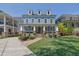 Inviting two-story home featuring dormer windows and a well-maintained front lawn at 4256 Weaver Se St, Smyrna, GA 30080