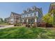 Charming two-story home with a covered front porch and beautifully landscaped front yard at 4256 Weaver Se St, Smyrna, GA 30080