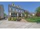 Stylish two-story home with a welcoming front porch, brick accents, and meticulous landscaping at 4256 Weaver Se St, Smyrna, GA 30080