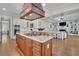 Open concept kitchen with gas range cooktop and attached living room at 4256 Weaver Se St, Smyrna, GA 30080