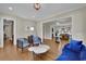 Open-concept living room with hardwood floors and stylish decor at 4256 Weaver Se St, Smyrna, GA 30080