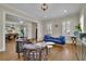 Bright living room featuring hardwood floors, recessed lighting, and elegant furniture at 4256 Weaver Se St, Smyrna, GA 30080