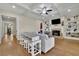 Cozy living room with coffered ceilings, built-in shelving, a fireplace, and hardwood floors at 4256 Weaver Se St, Smyrna, GA 30080