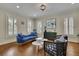 Cozy living room featuring stylish seating, hardwood floors, and abundant natural light at 4256 Weaver Se St, Smyrna, GA 30080